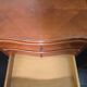 Pair of Louis XV style bedside tables in cherry wood marquetry.