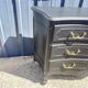 Louis XV style black lacquered chest of drawers with four drawers.