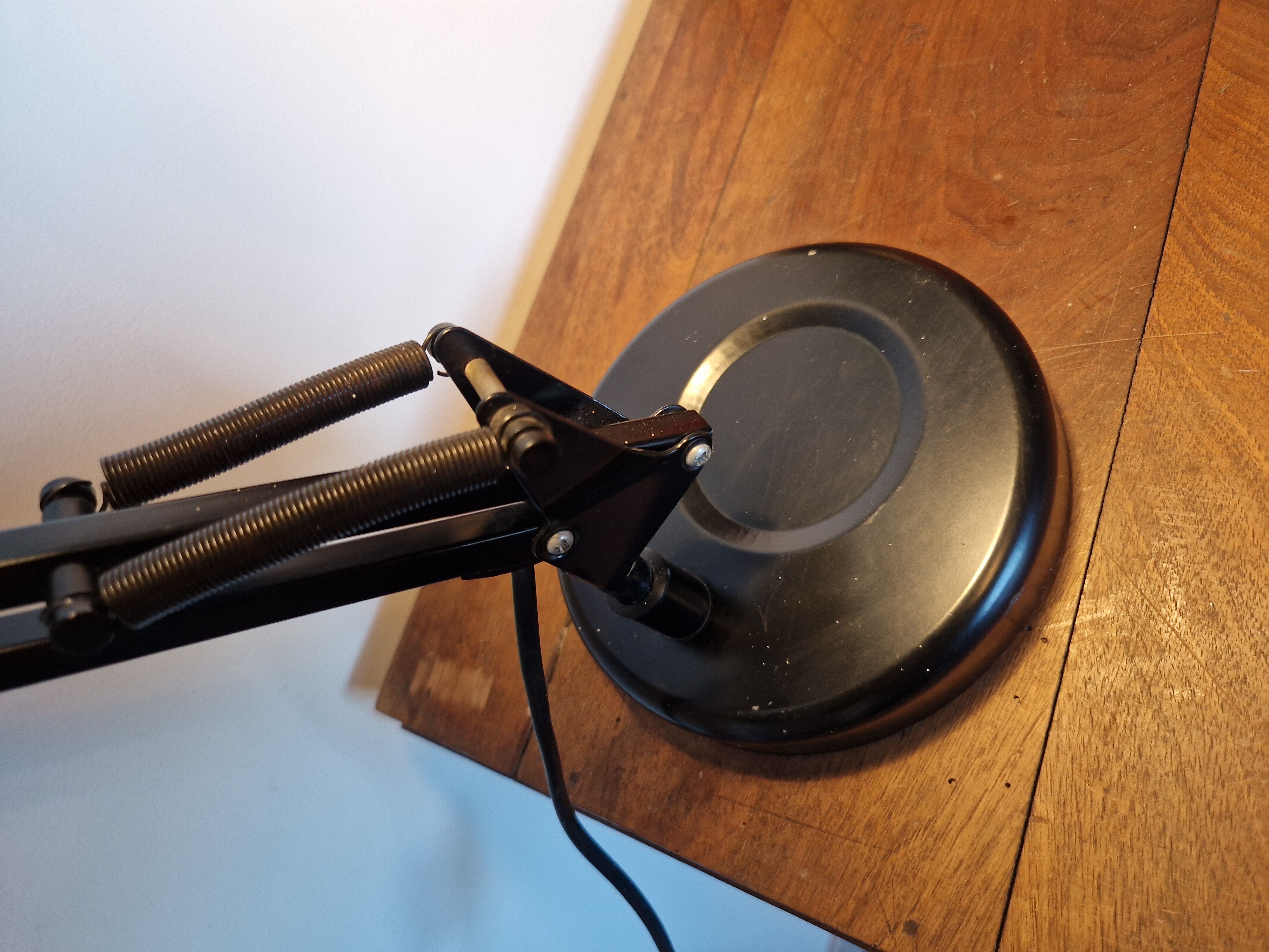 Black vintage articulated desk lamp