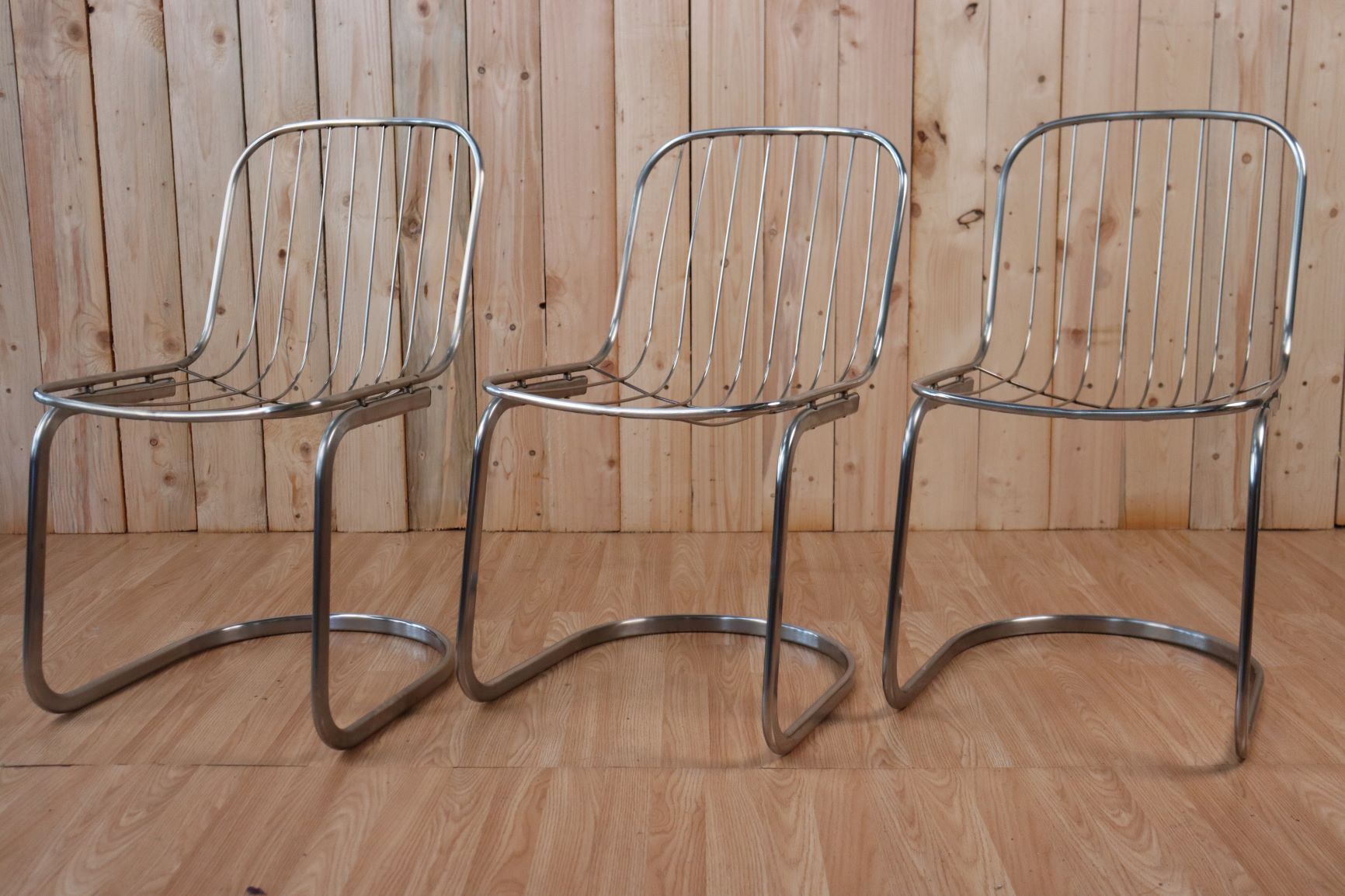 Series of 6 tubular steel chairs