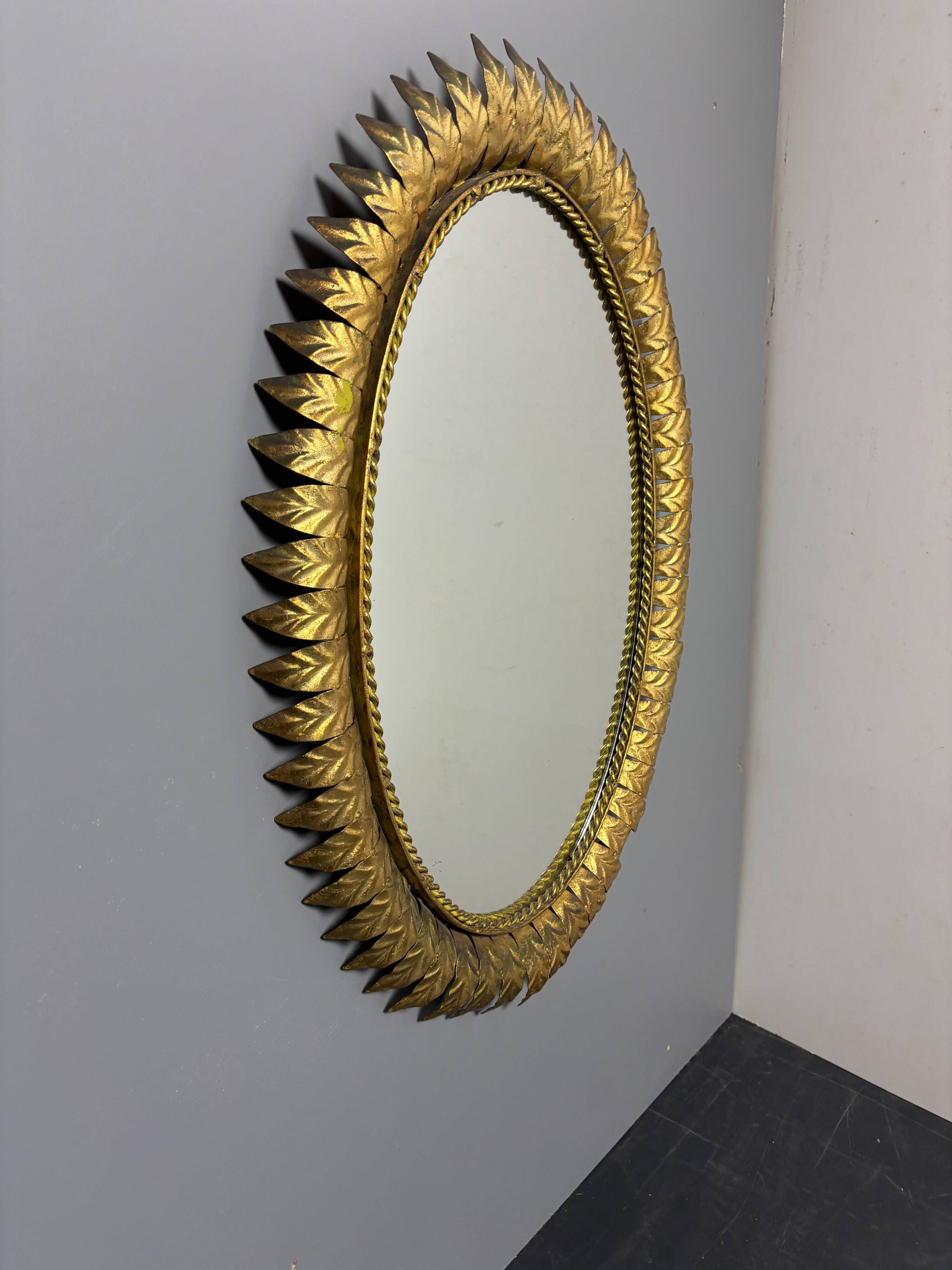 Midcentury bohemian hollywood regency spanish gilt metal sun mirror, 1960s