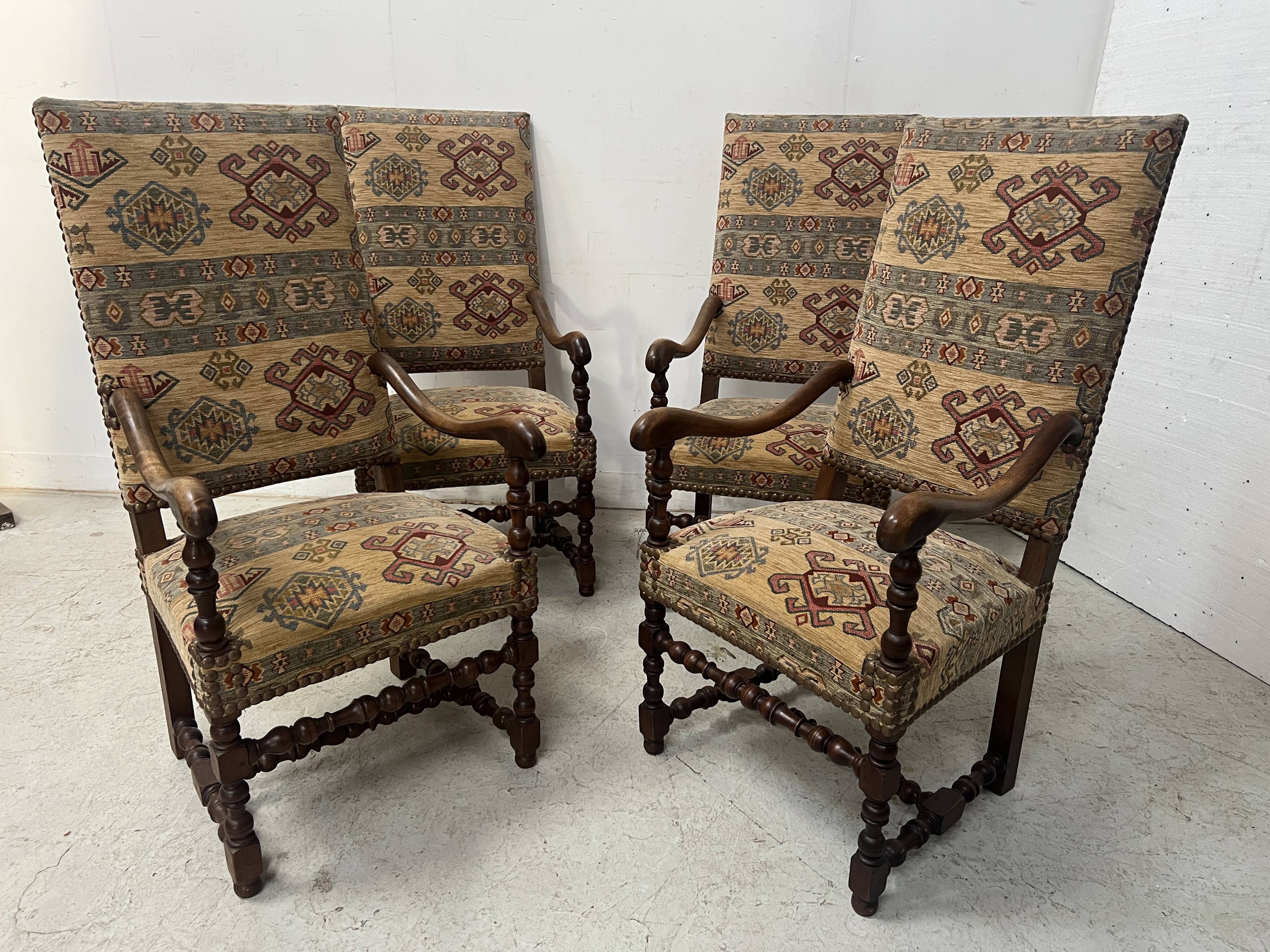 Set of four Louis XIII style high-back armchairs, 20th century.