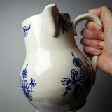 Fine earthenware pitcher with blue decoration, attributed to Saint-Uze, 19th century.