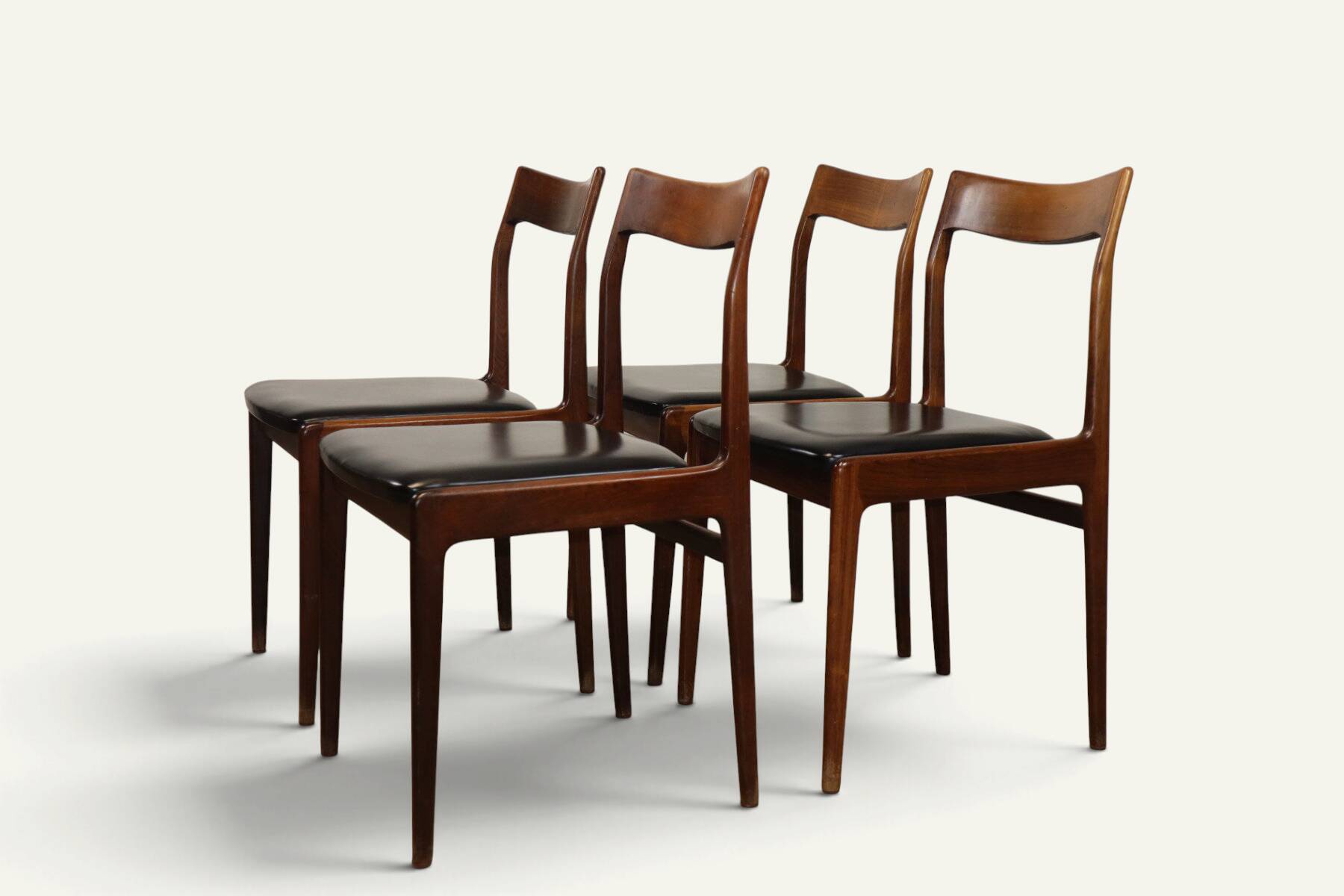 Set of 4 vintage teak and black faux leather chairs – 1960s