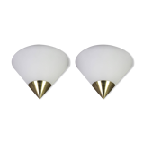 Pair of opaline glass wall lights designed by Limburg, Germany.