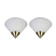 Pair of opaline glass wall lights designed by Limburg, Germany.