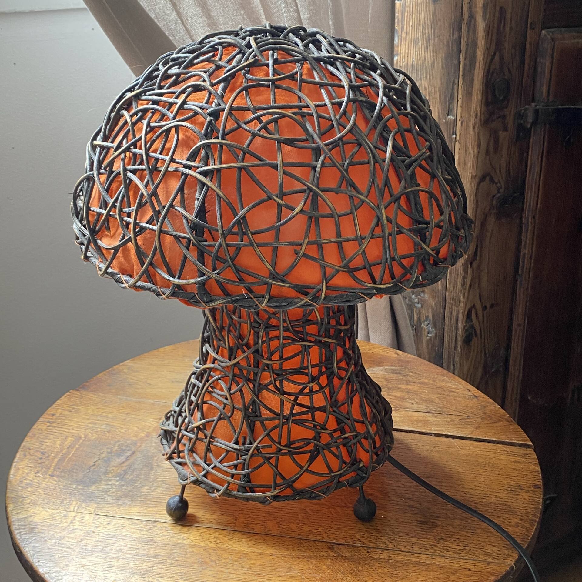 Large mushroom lamp in woven rattan