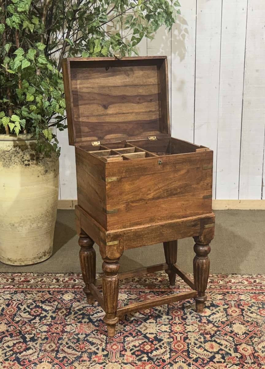 Teak bottle cabinet on legs in marine style