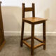 Rustic solid wood bar counter with 4 matching stools – wine rack & storage