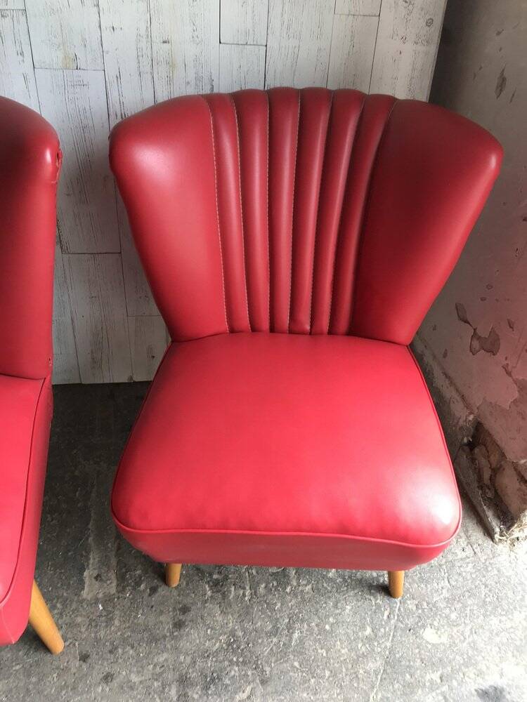 Mid-century cocktail chair in red vinyl and beech, 1950s design from Czechoslovakia.