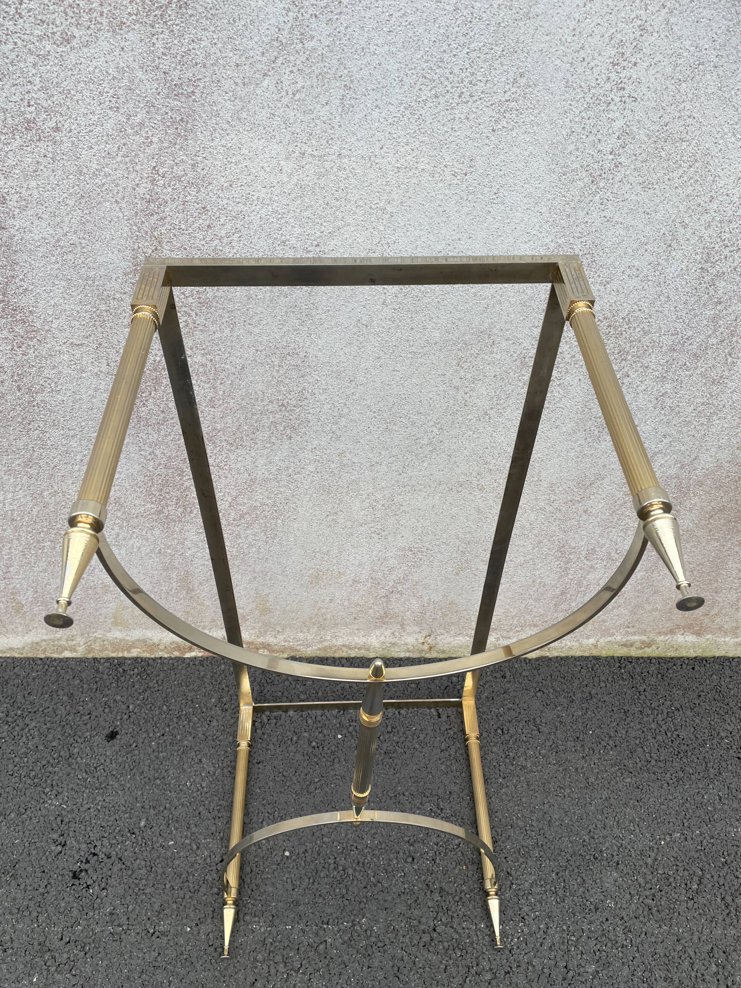 Coffee table in gilded brass and veined green marble