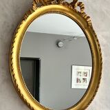 Gilded mirror with pediment