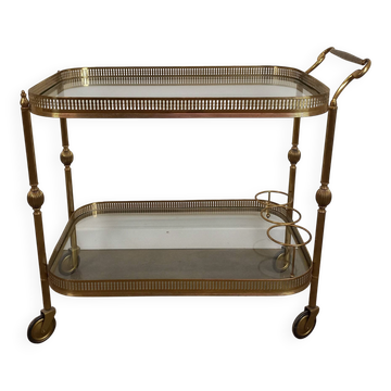 Rolling trolley in gilded brass and glass