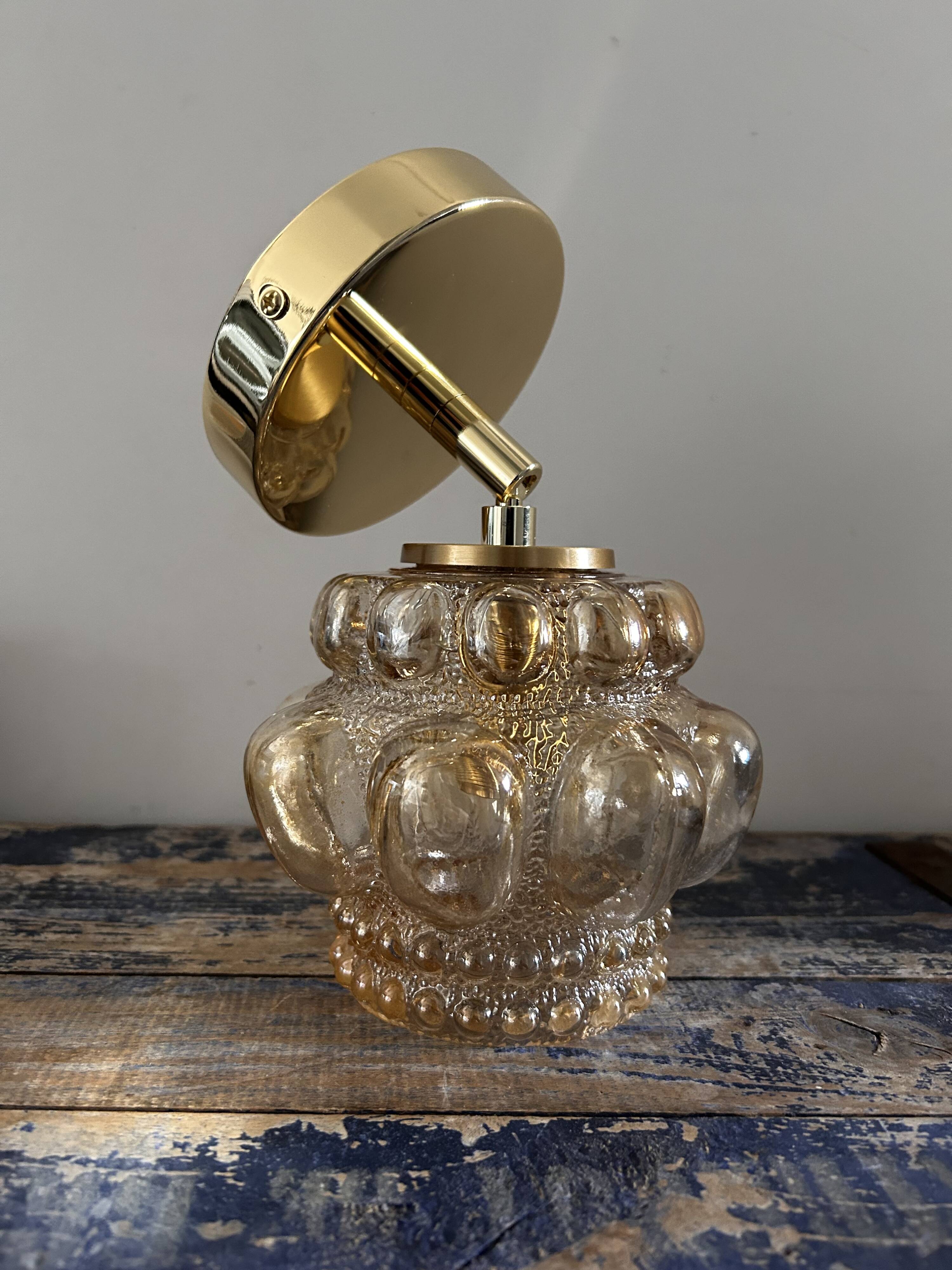 Bubbled glass wall light