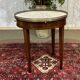 Louis XVI style bouillotte table in mahogany with a white marble top.