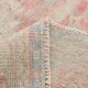 Tapis vintage rouge pâle et beige