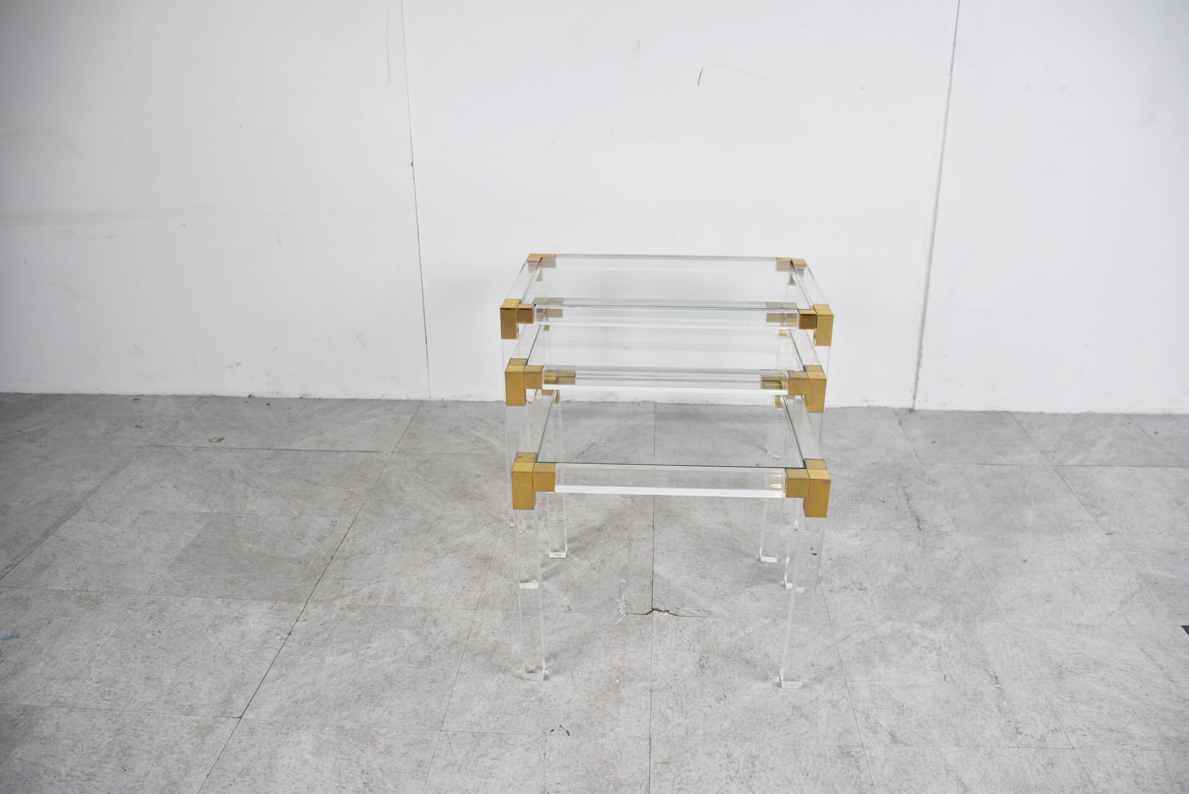 Vintage lucite and brass nesting tables, 1970s
