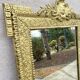 19th-century antique mirror in carved gilded wood, Napoleon style.