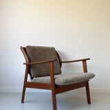 Vintage teak wooden armchair
