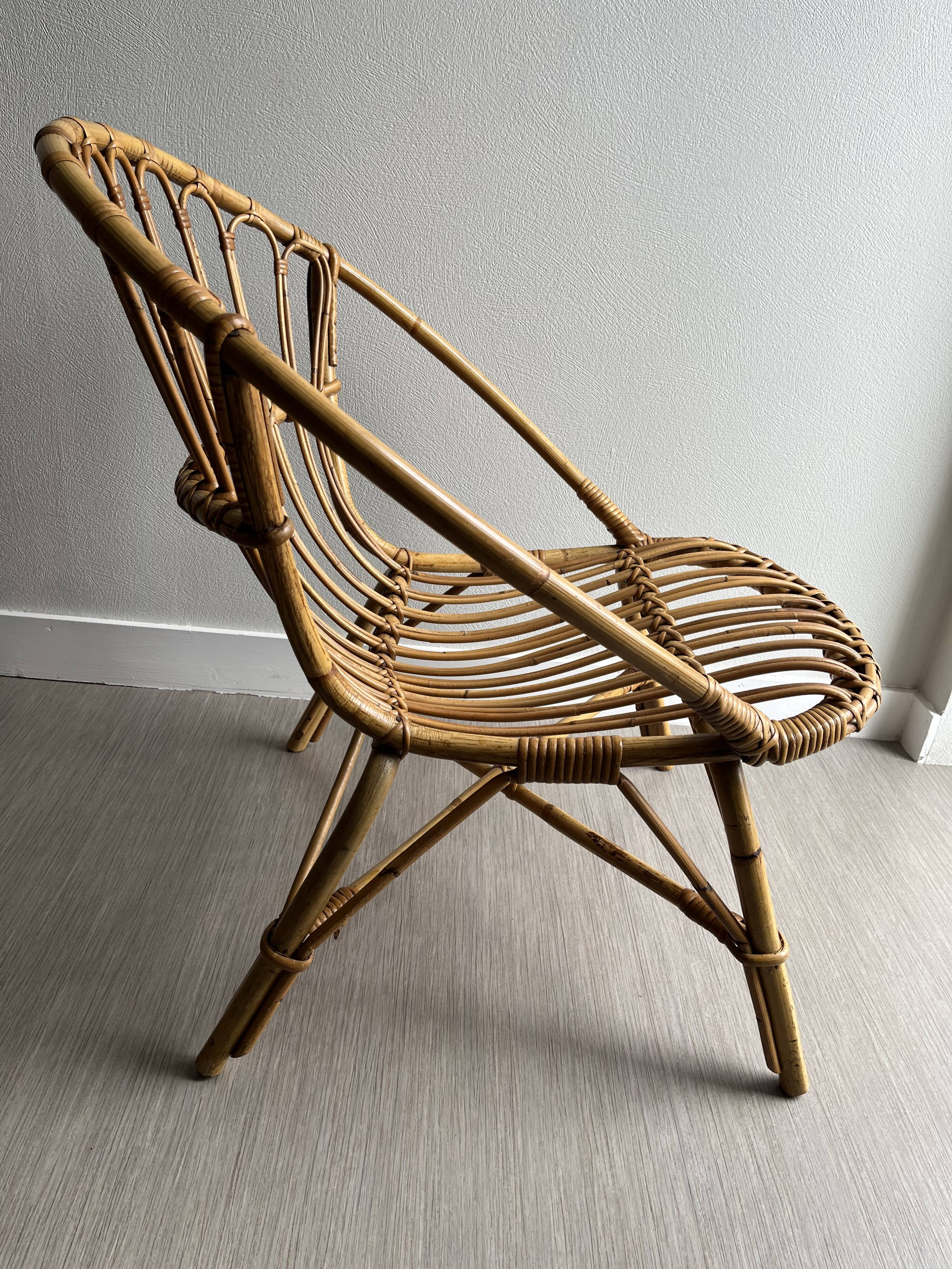 Vintage rattan shell armchairs