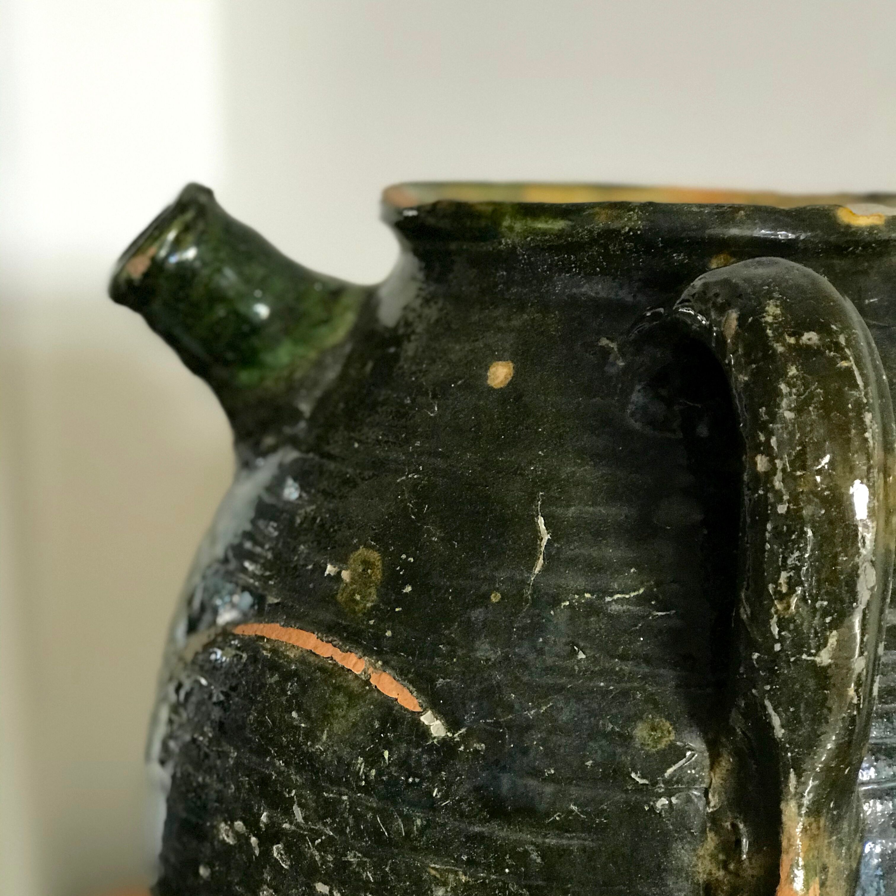 Green glazed ceramic pot