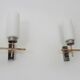 Pair of chrome-plated metal and opaline brass wall lights. 1960s