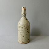 Sandstone bottle signed Guy Baudat, 70s