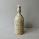 Sandstone bottle signed Guy Baudat, 70s