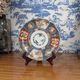 Signed Imari porcelain plate with Japanese lake and deer decoration, 19th century