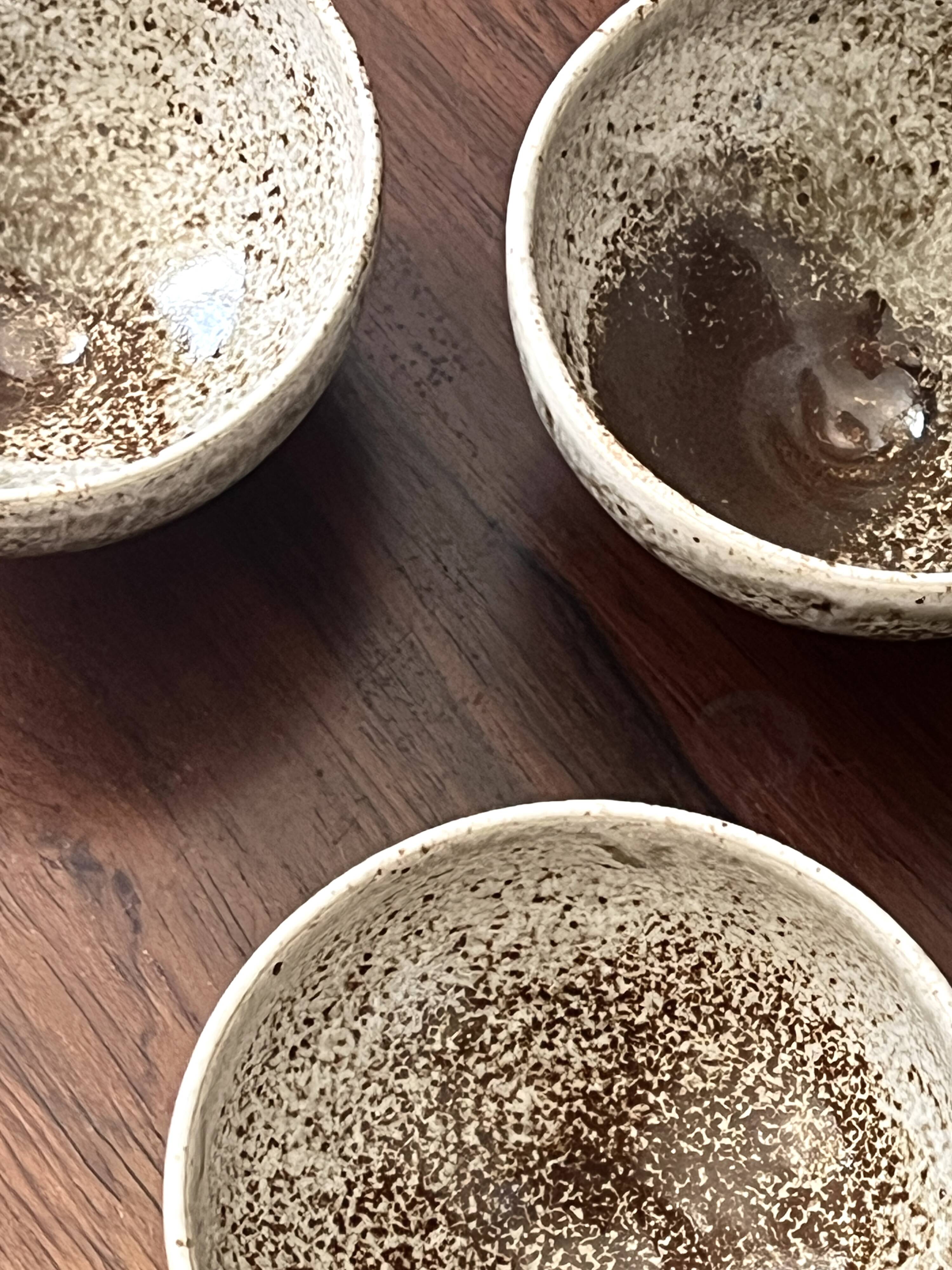 Set of 4 hand-turned glazed ceramic bowls