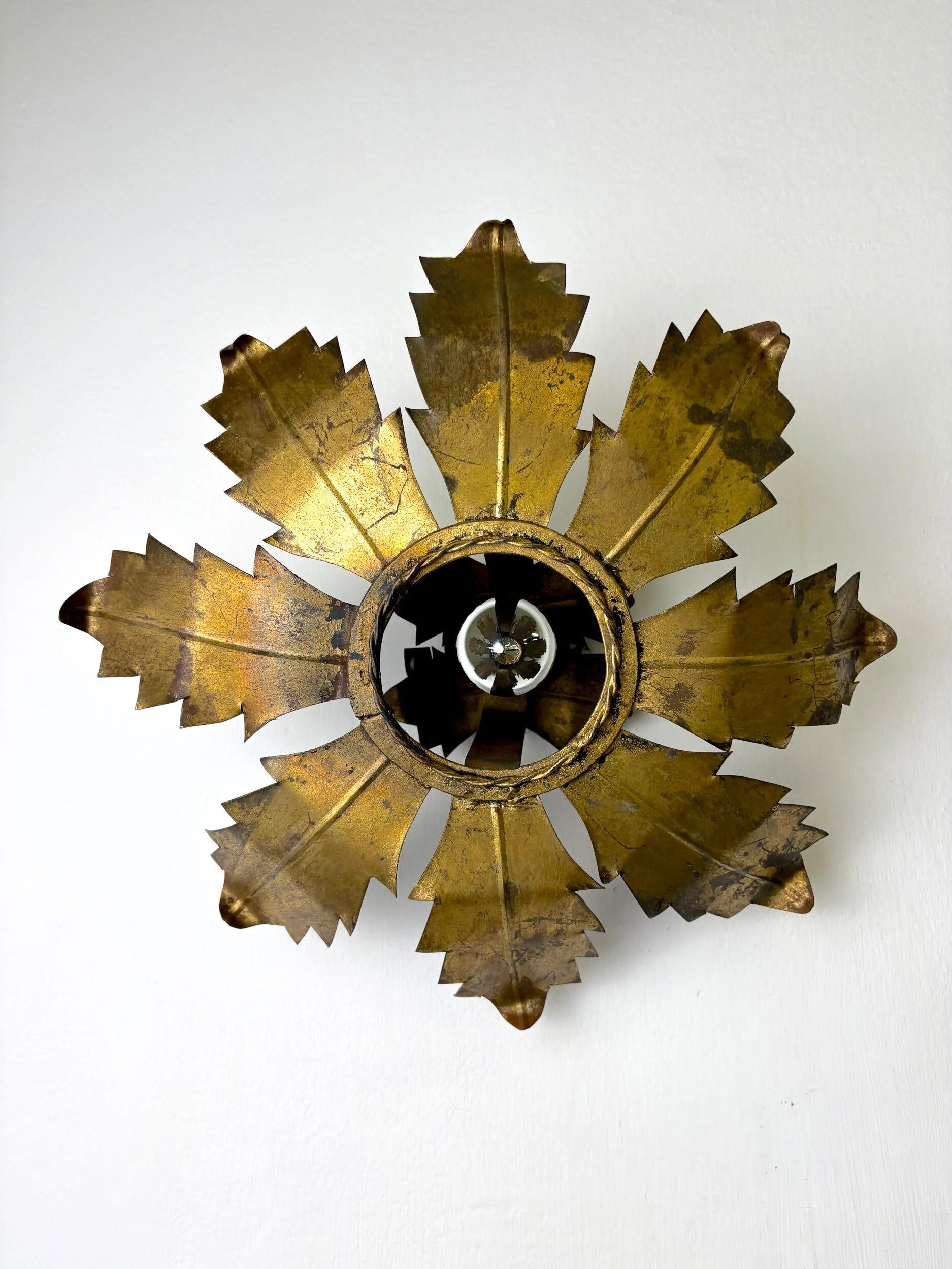 Spanish sunburst flush mount light fixture in gilt iron, circa 1970s