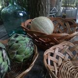 Set of three old rattan baskets