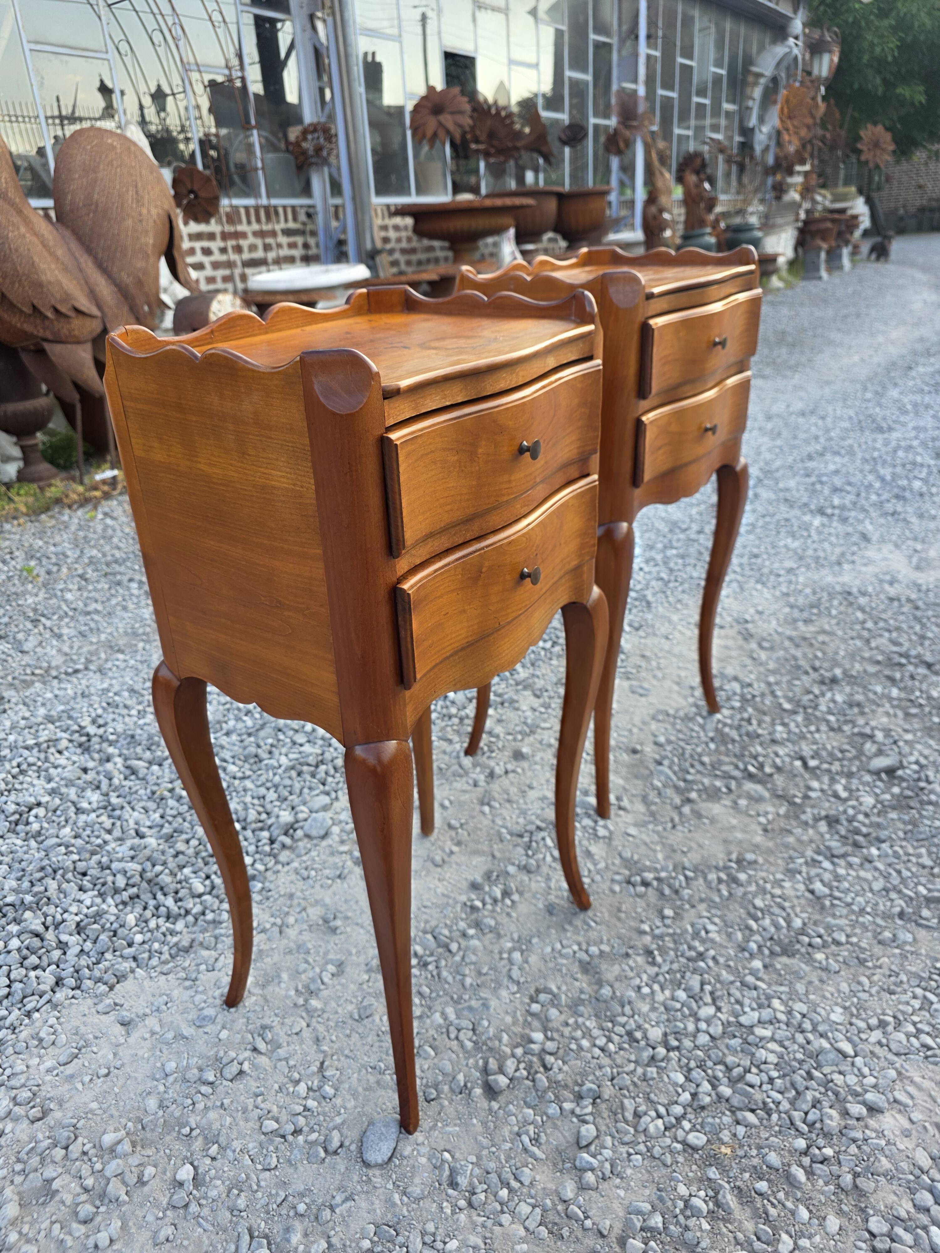 Pair of Louis XV style bedside tables in solid cherry wood.