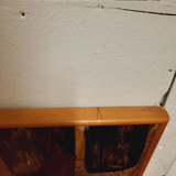 Vintage wooden coat hangers and glazed copper