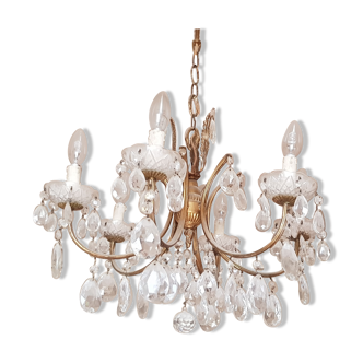 Old brass chandelier with grapevine