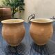 Pair of terracotta and ceramic pots