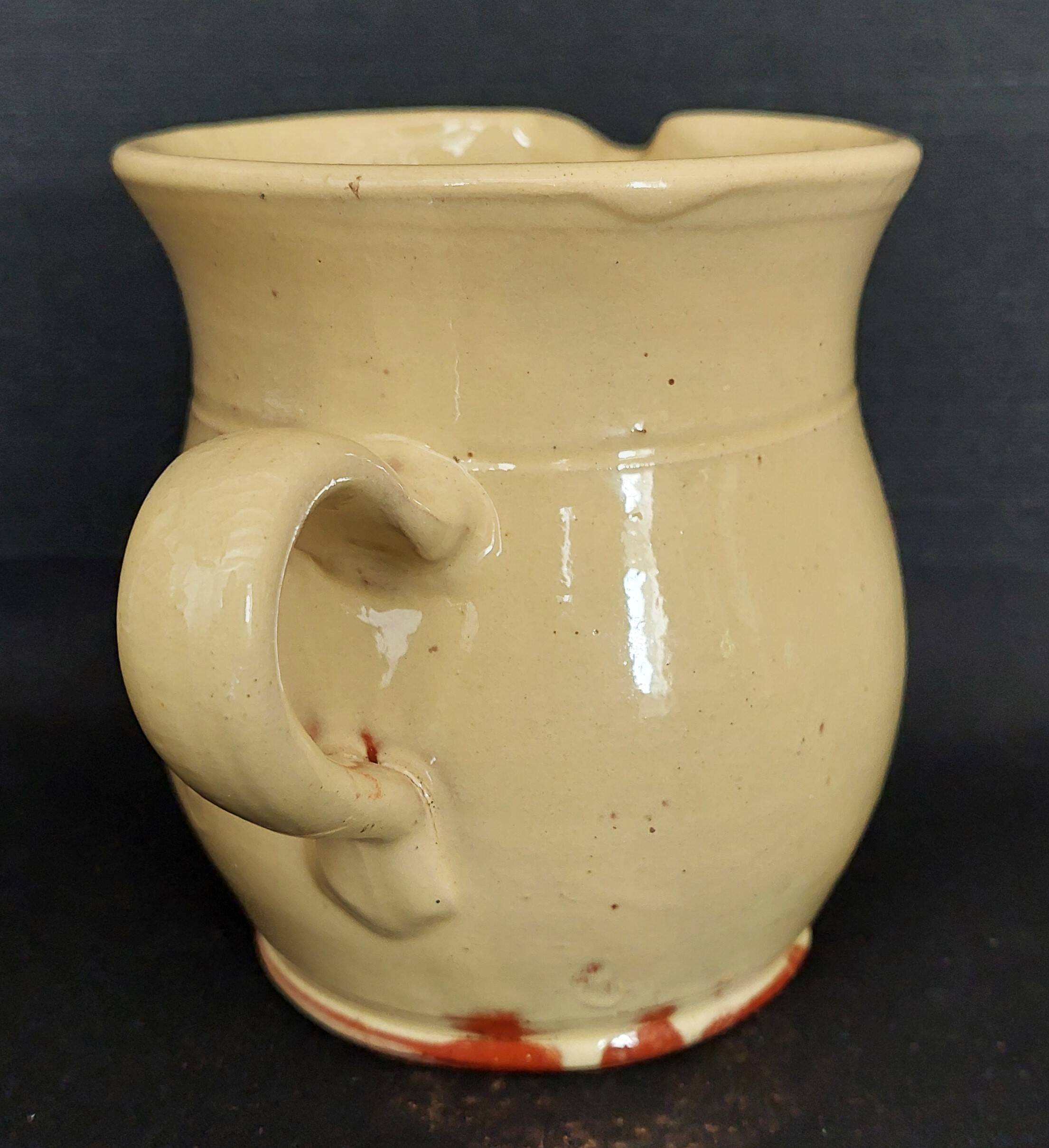 20th century Alsace glazed terracotta pitcher