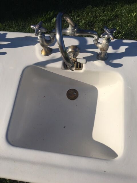 Old double sink with faucet