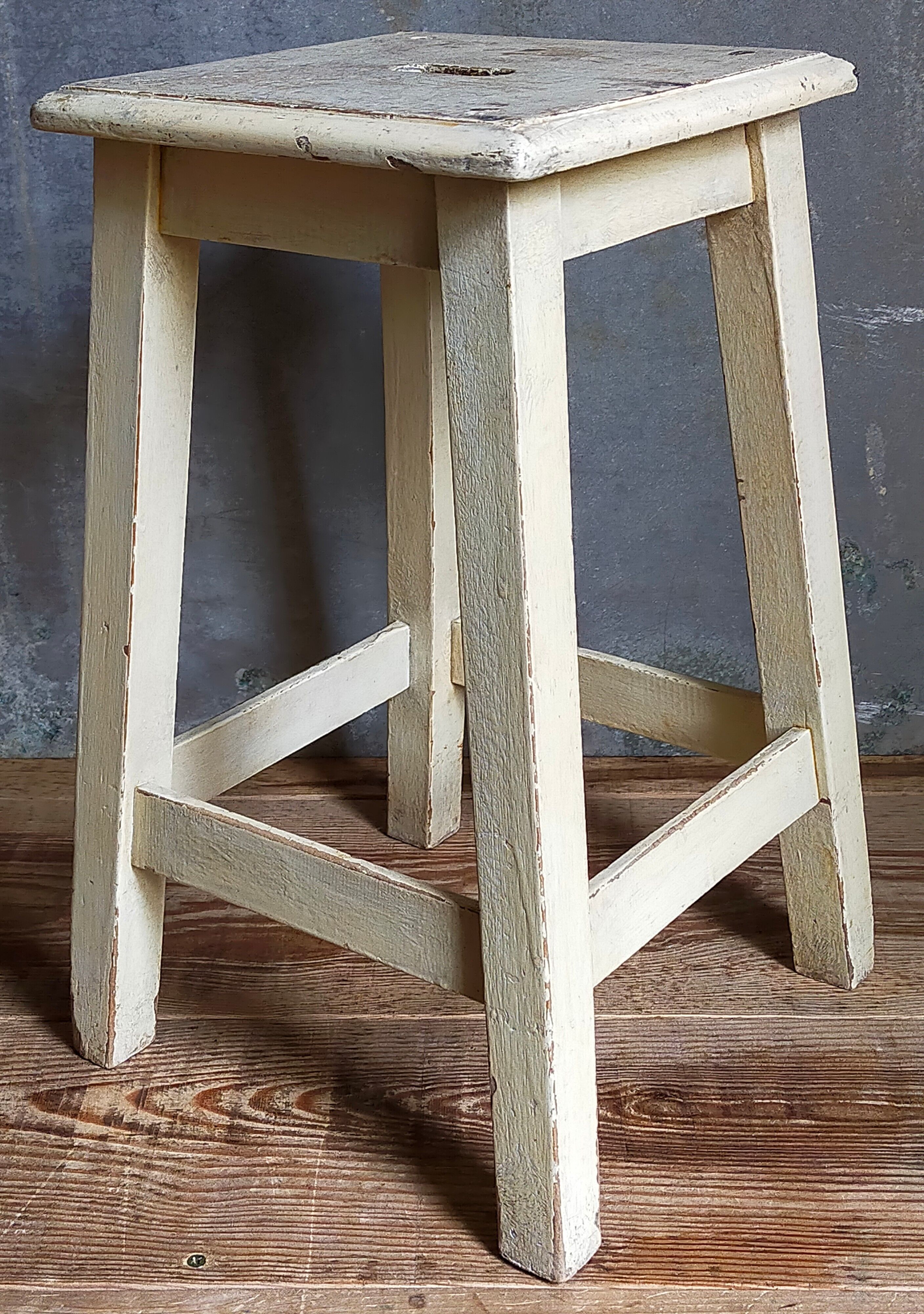 Wooden workshop stool with old patina