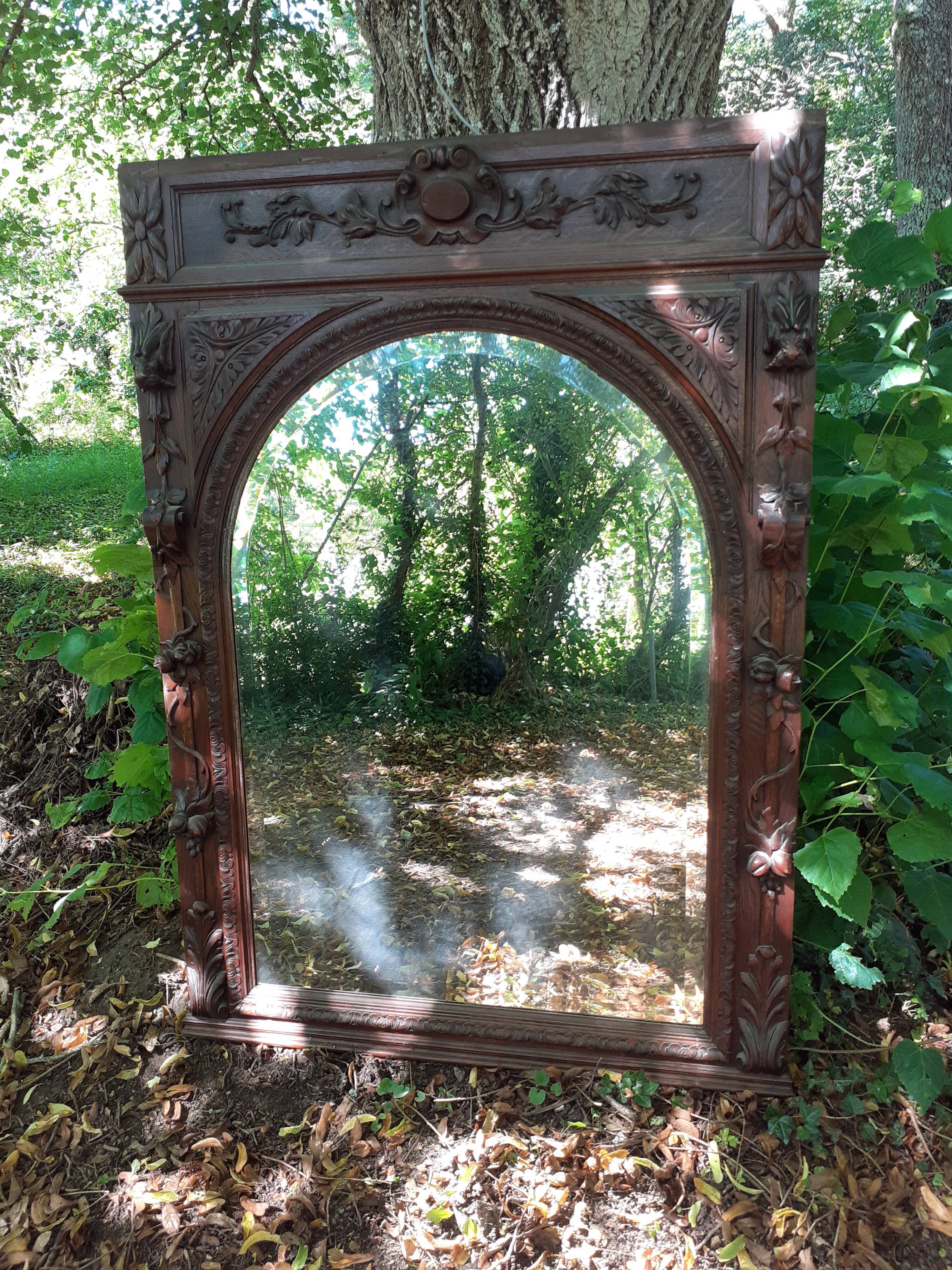 Trumeau mirror beveled in carved oak 104x144cm