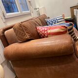 Brown braided leather sofa
