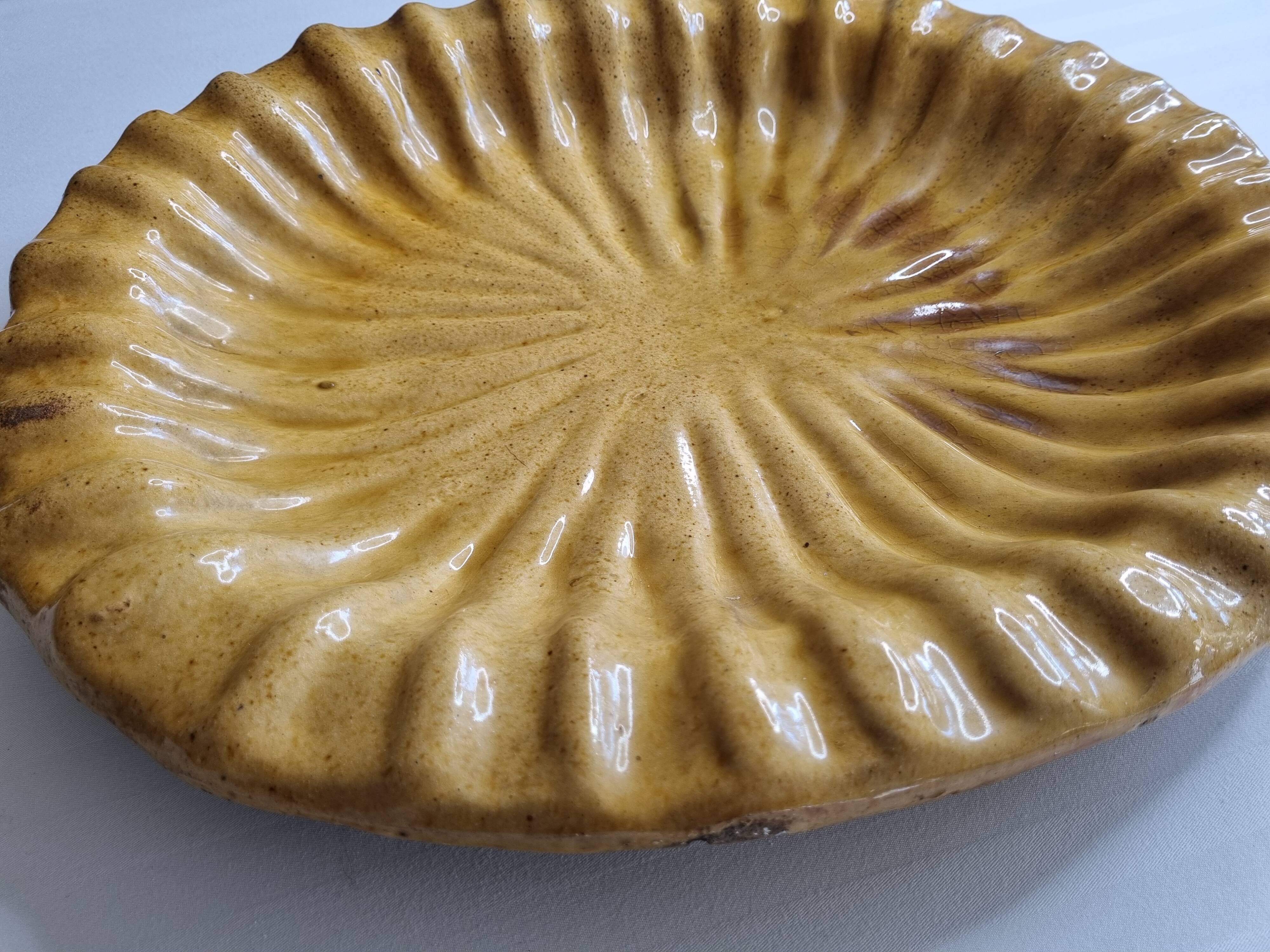 Large dish in enamelled terracotta, ochre, 47 cm