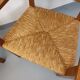 Suite de 2 fauteuils brutalistes vintage en bois de chêne et paille