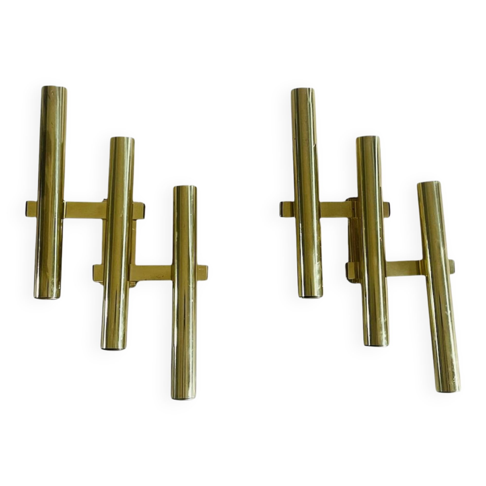 Tubular wall sconces in brass, Italian design from the 1970s, attributed.