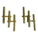 Tubular wall sconces in brass, Italian design from the 1970s, attributed.