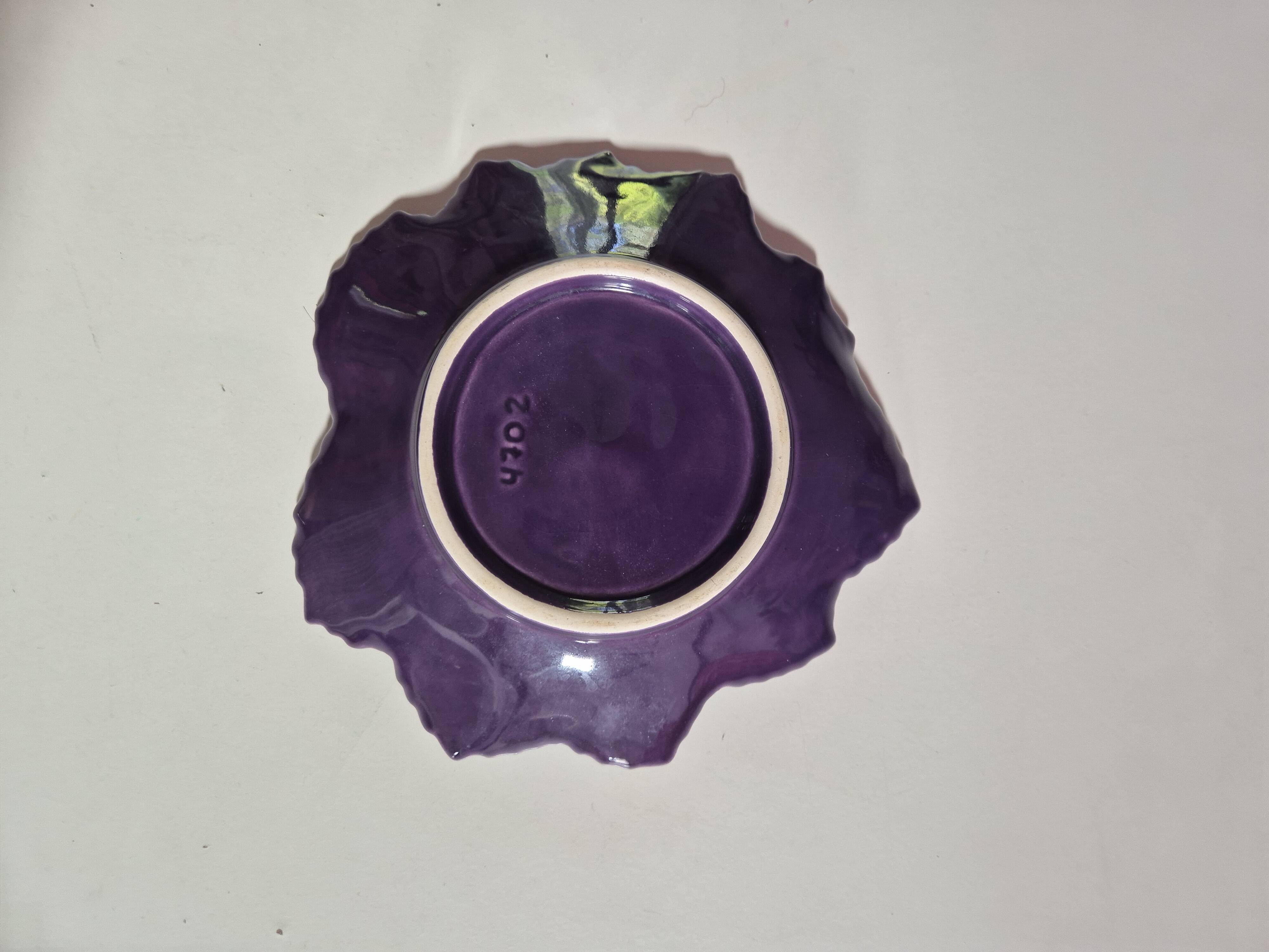 purple ceramic bowl in the shape of a tree leaf