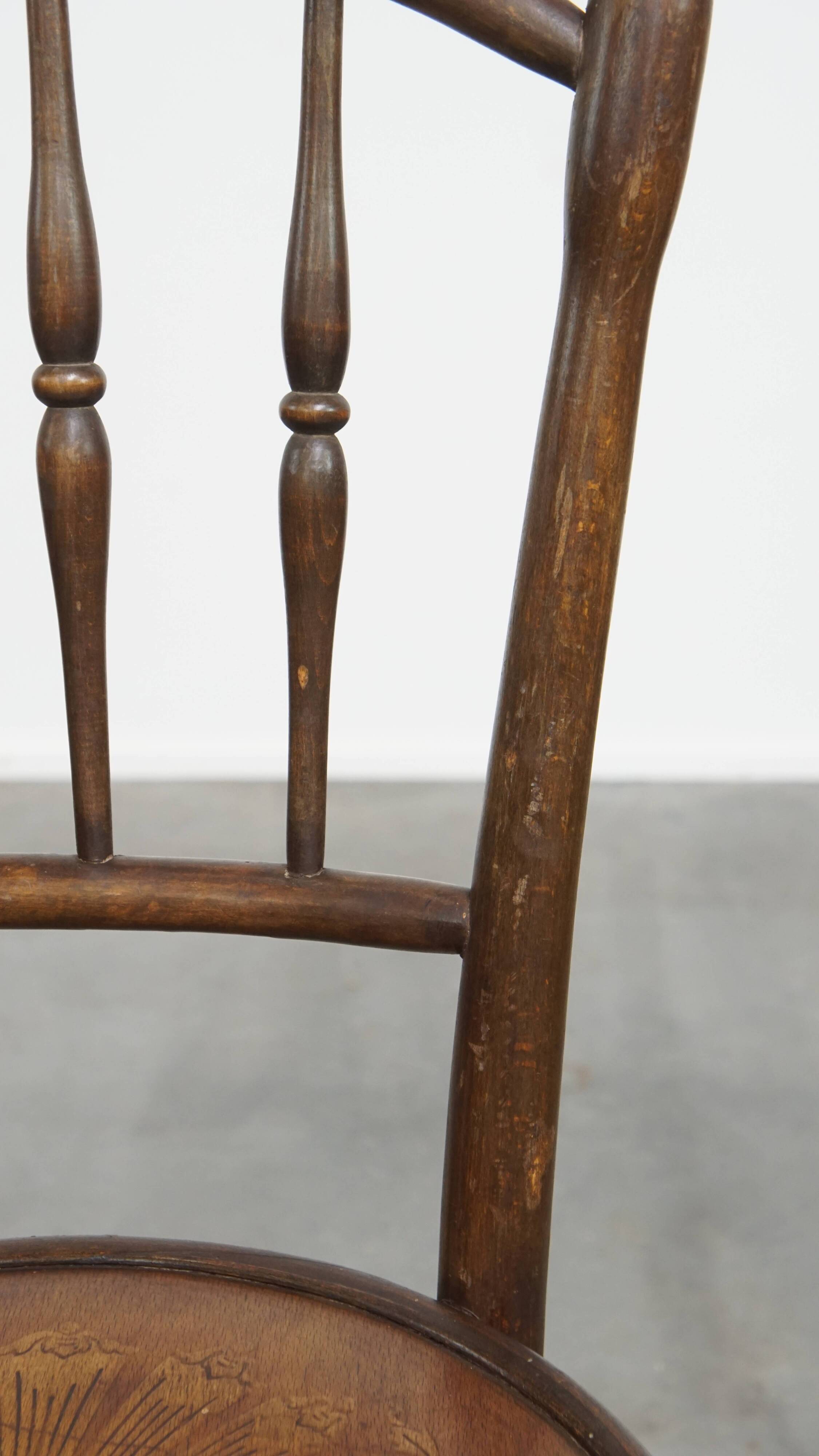 Bistro chair with carved seat