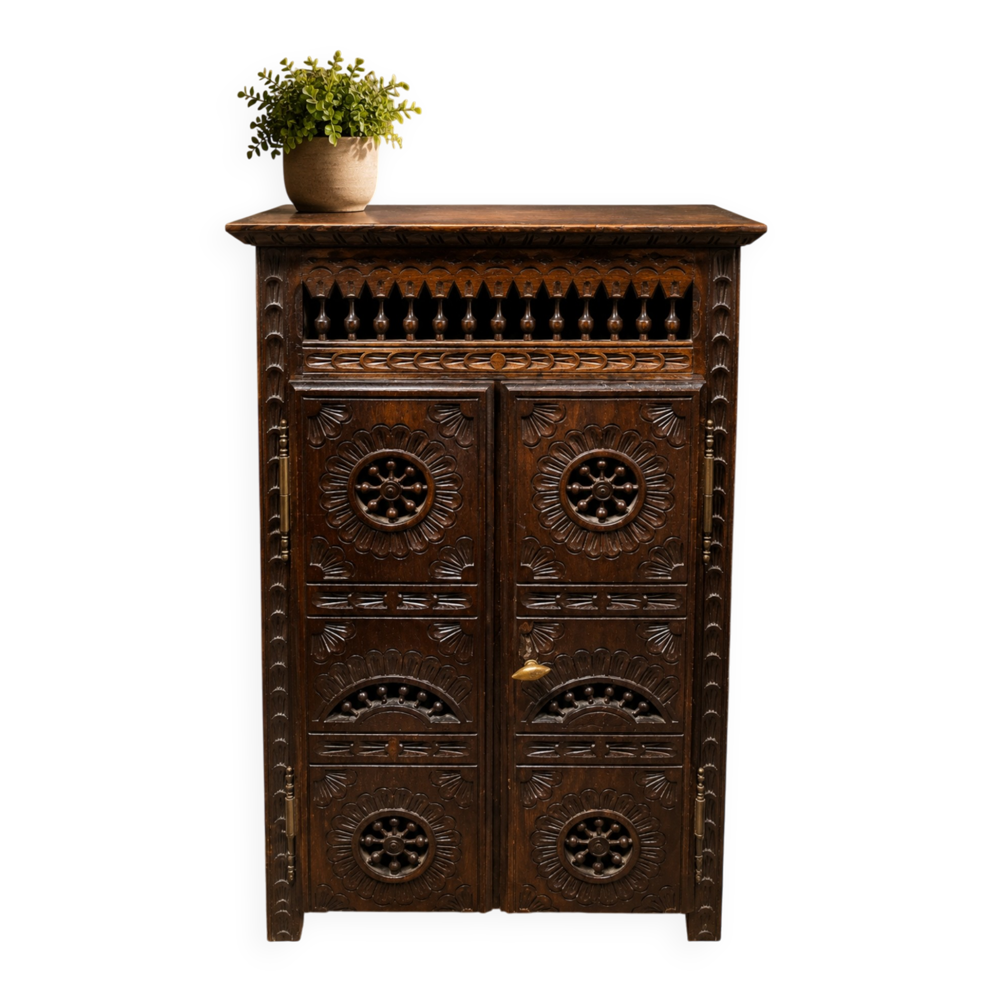 Small antique side table in carved wood.