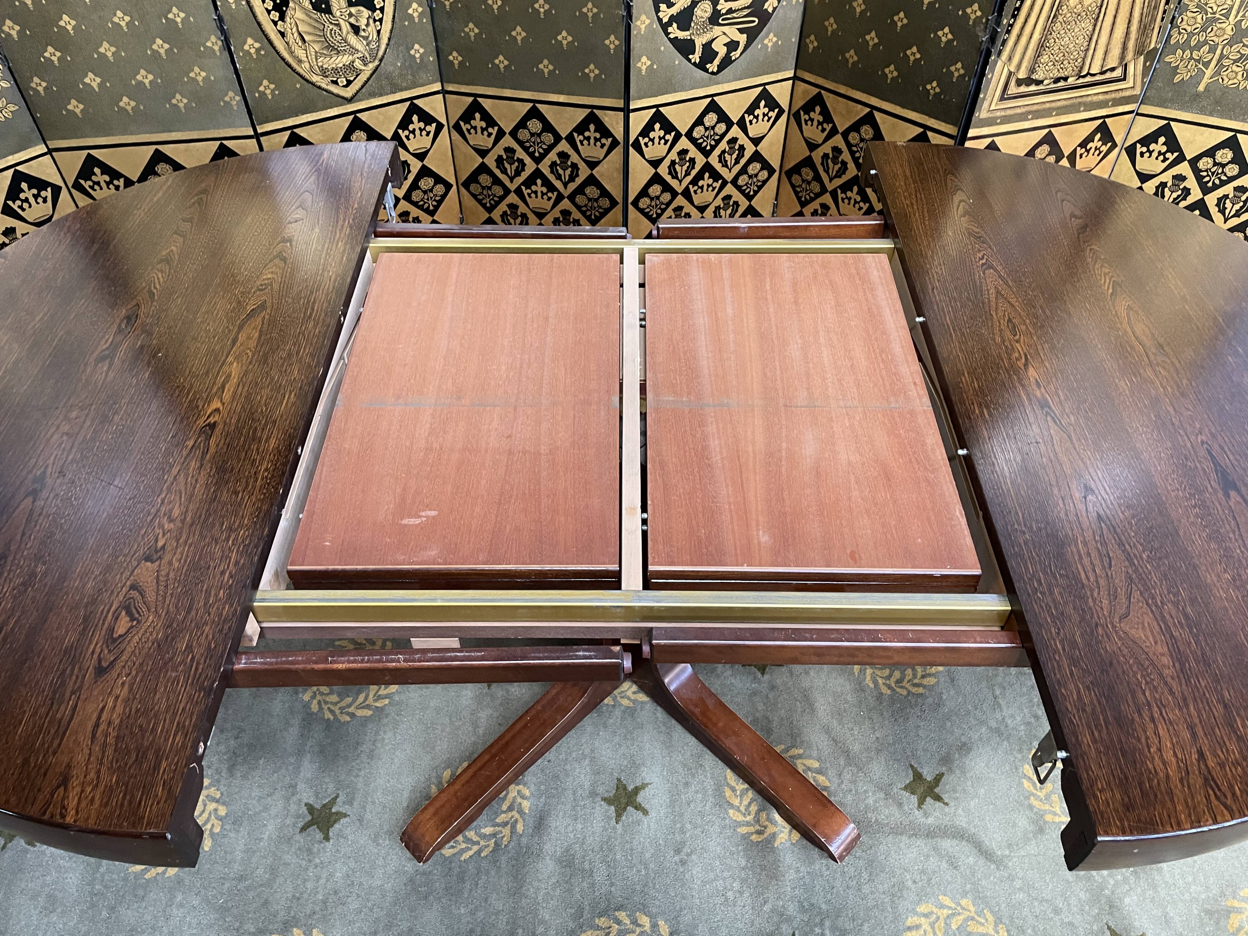 Baumann 1970 round table with integrated extensions