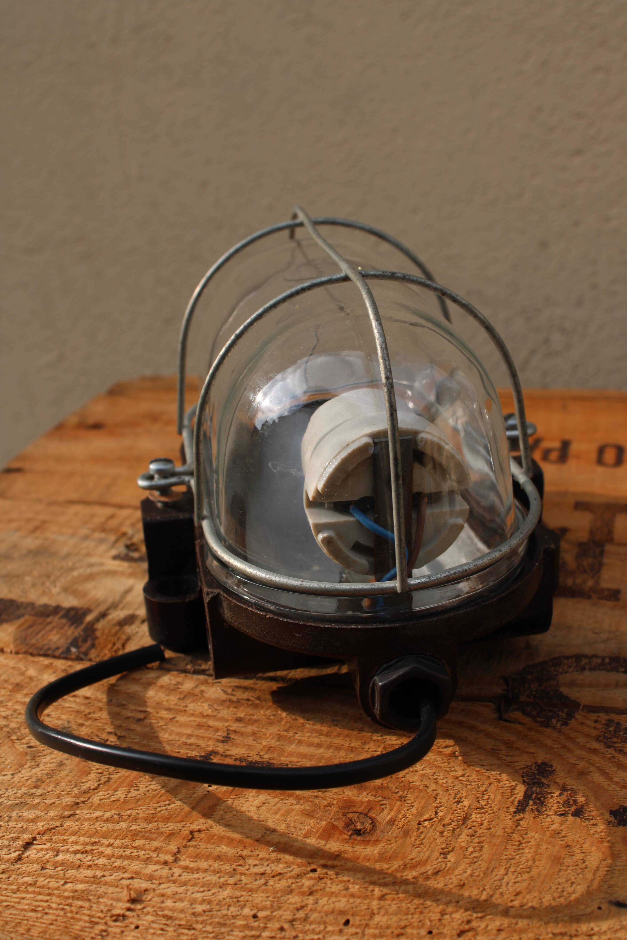 Sconce in bakelite and glass